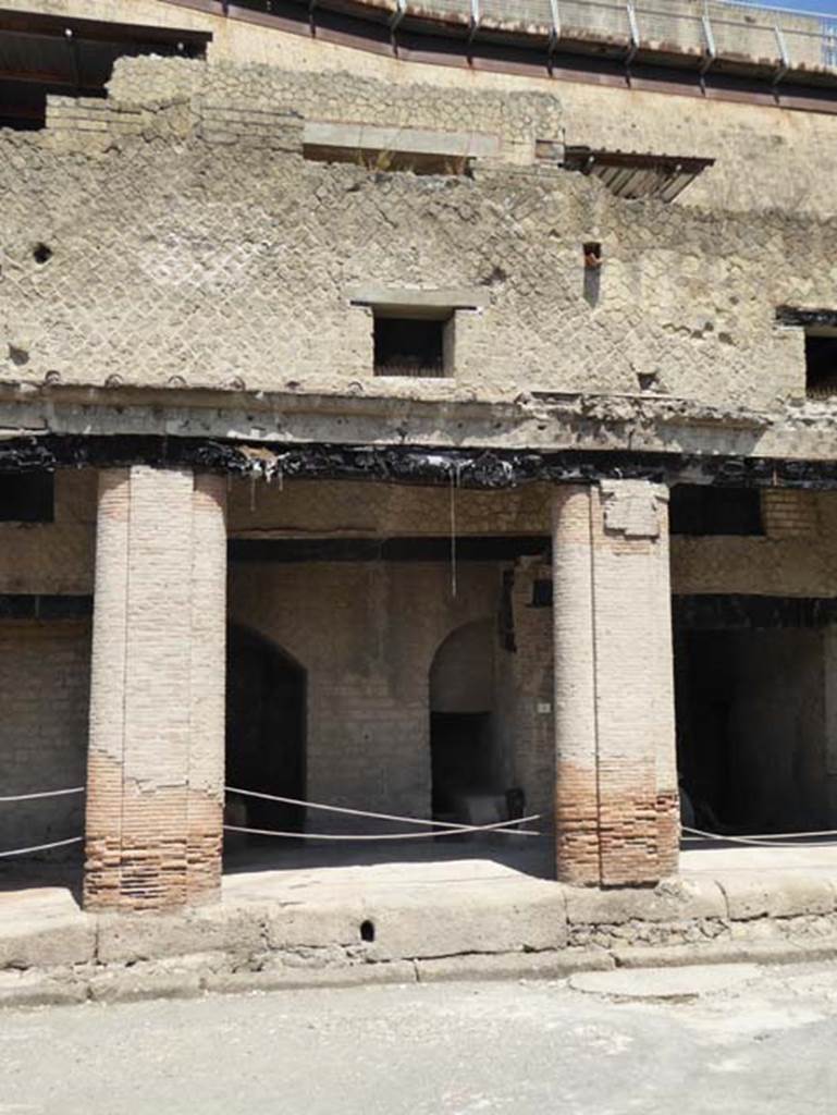 Decumanus Maximus, Herculaneum, July 2015. Building on north side of the Decumanus Maximus, doorway and upper floors of large house, number 3, unexcavated. Photo courtesy of Michael Binns.